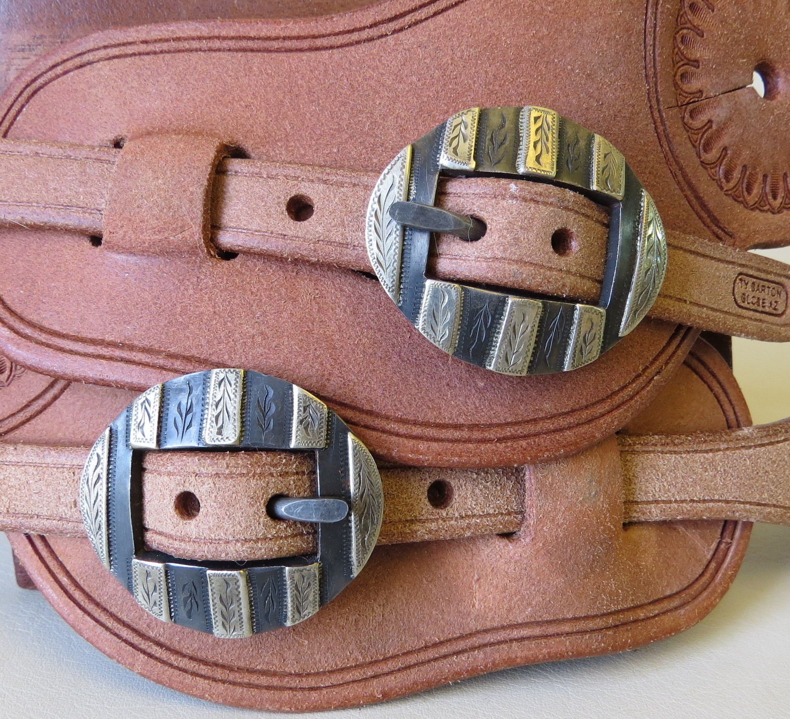 custom spur strap buckles